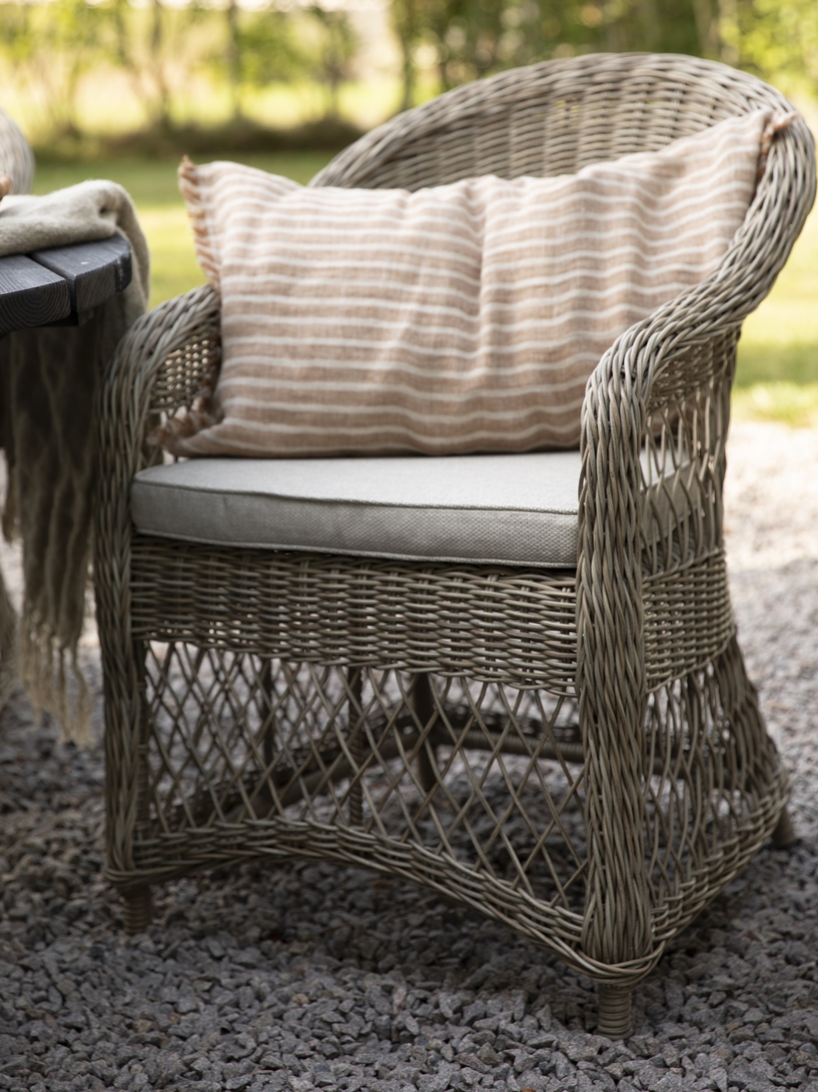 Utendørs lenestol i naturfarget syntetisk rotting Utendørs lenestol i naturfarget syntetisk rotting