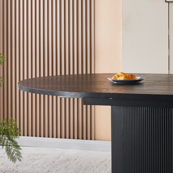 Astrid rundt spisebord uttrekkbart Ø140 cm til 180 cm - Sortbeiset eik Astrid rundt spisebord uttrekkbart Ø140 cm til 180 cm - Sortbeiset eik