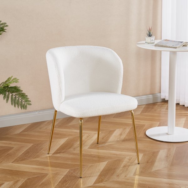 Spisestuestol i bouclè med messingben Spisestuestol i bouclè med messingben