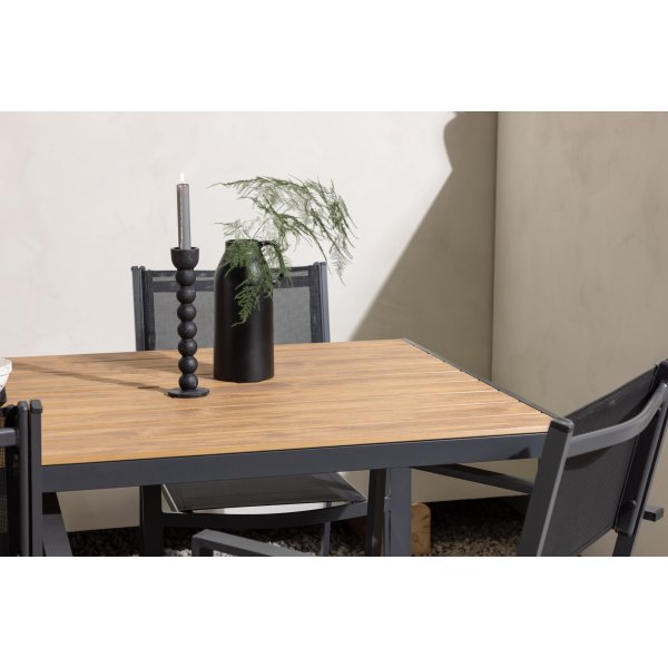 Matvaregruppen i Chania; 6 stoler med bord 205 x 90 cm - Svart/natur Matvaregruppen i Chania; 6 stoler med bord 205 x 90 cm - Svart/natur